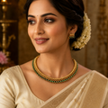 Traditional Gold-Toned Necklace Set with Green Accents and Matching Earrings