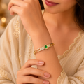 Gold-Tone Bracelet with Green Natural Stone Accents