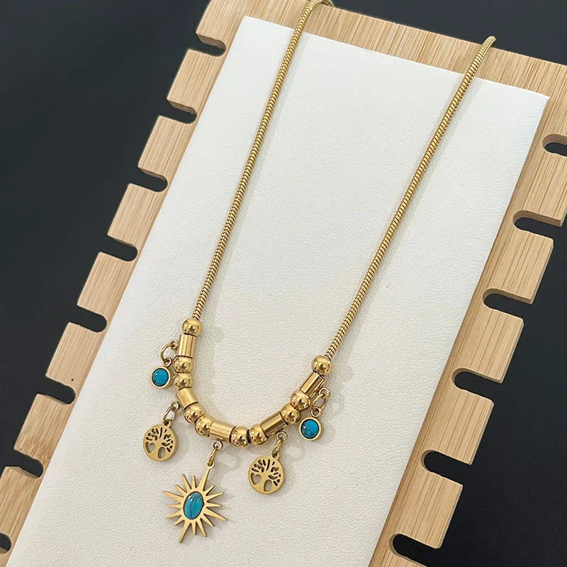 Gold-Plated Sun & Tree of Life Charm Necklace with Turquoise Accents